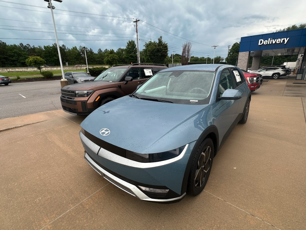 Hyundai Ioniq 5 and other vehicles on display at Crain Hyundai of Fayetteville